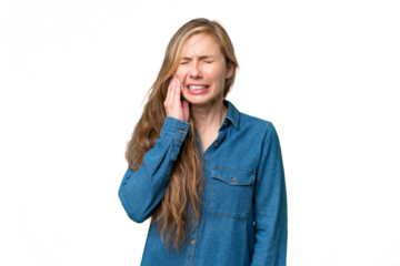Young blonde woman over isolated background with toothache
