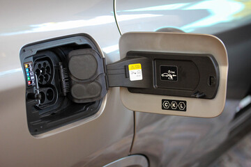 Fully opened charging ports of a new electric car