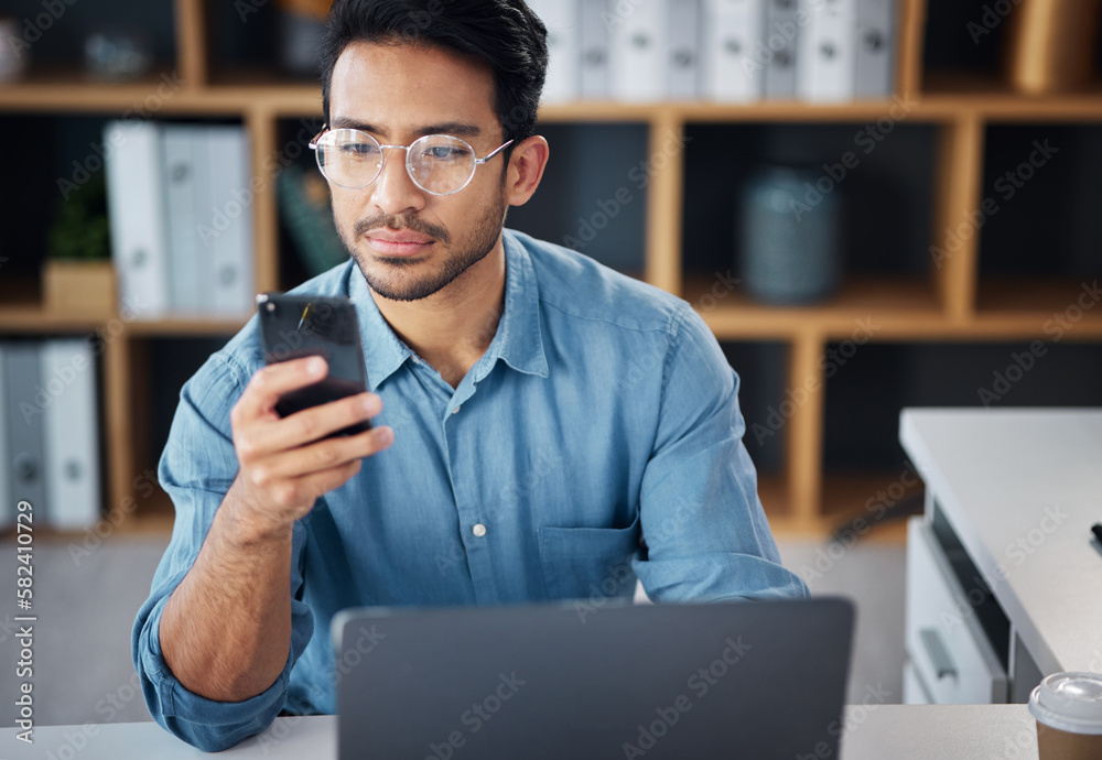 Poster phone, serious and businessman texting on mobile app in company office as internet or online communi