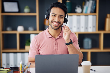Asian man, call center and portrait smile on laptop for consulting, customer service or support at office desk. Happy male consultant with headphones by computer for telemarketing or online advice