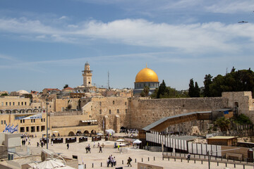 Fototapeta na wymiar The capital of religions. Western Wall and Dome of The Rock in old city of Jerusalem.