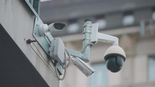 Closeup Video Of Surveillance Video Camera Monitoring Safety On City Street