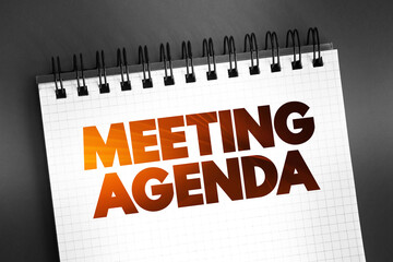 Meeting Agenda text on notepad, concept background