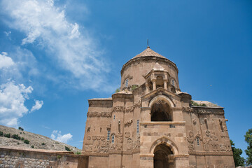 View of Cathedral of the Holy Cross, Aghtamar known in Turkish as 'Akdamar Adası Kilisesi' and blue sky in 06.13.2022, Edremit, Van,Turkey 