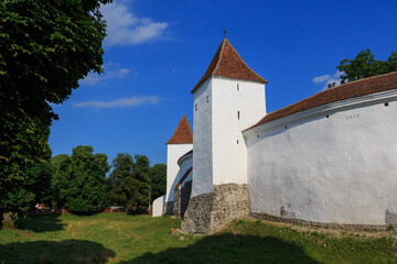 Fototapeta na wymiar View of the historical Church-fortress in the city of Hărman. Transylvania. Romania