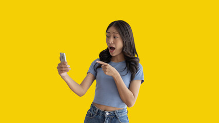 Call sign, Bright young asian woman inviting to call isolated on yellow background, Suggest to call or invite to apply for membership, Isolated on yellow background...