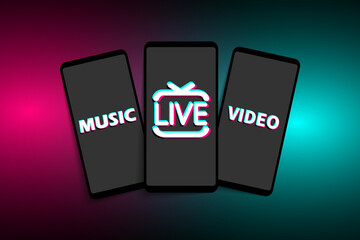 Smartphones with icons of the popular social media TikTok on a modern background. LIVE, VIDEO, MUSIC.