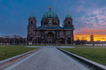 Berlin, Germany 03-16-2023 The Berlin Cathedral during a colorful sunrise on the Museum Island in...