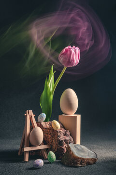 concept spring. freakebana. Trendy card with purple tulip and Easter eggs. easter concept. Creative image of flowers with blurred trail, fantasy motion effect, motion blur