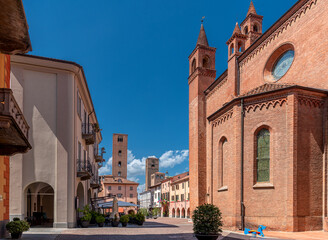 Alba, Langhe, Piedmont, Italy - View of Duomo square with the town hall among old houses and...