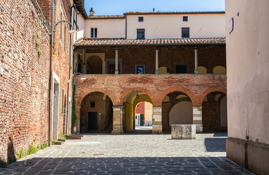 The lower loggia of Piazza Ospitalieri, in the old town of Altopascio, Lucca province, Tuscany in central Italy