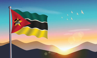 Mozambique flag with mountains and morning sun in background