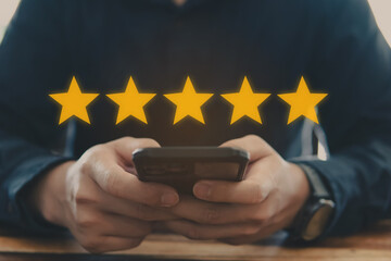 Customer review good rating concept, hand pressing smartphone and five star icon on visual screen for positive customer feedback, testimonial and testimony, user comment and feedback for review. - obrazy, fototapety, plakaty