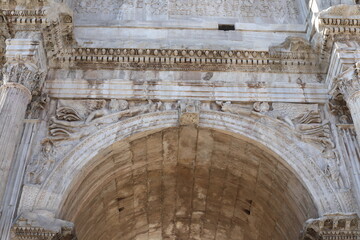 Ancient the Arch of Constantine in Rome, Italy. Beautiful view on a sunny summer day.