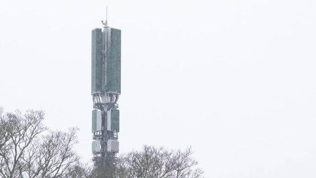 Mobile network operator mast un snow in england uk.