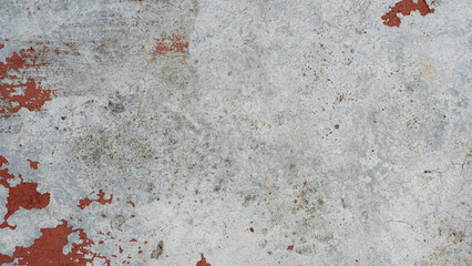 Fototapeta premium Background and textured above view of old cement floor with some brown stains on it.