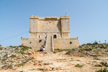 Fototapeta na wymiar Saint Mary's Tower, a Wignacourt watchtower Tower also known as the Comino Tower on the island of Comino, Malta.