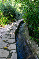 Path and ditch between Titus Tunnel and Beşikli Cave by trekking route in Çevlik, Samandag, Hatay.