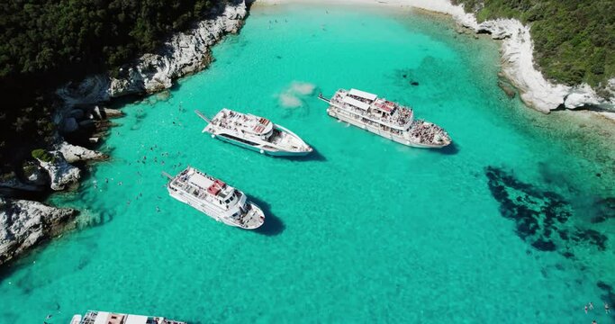 Tropical paradise beaches of Voutoumi and Vrika with turquoise clear sea, Antipaxos island, Ionian, Greece, Aerial drone bird's eye view