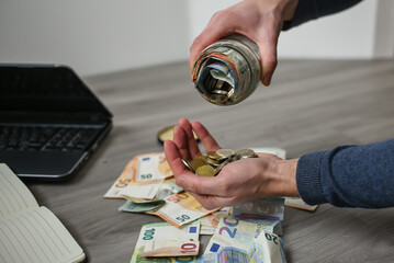 Putting money into the jar