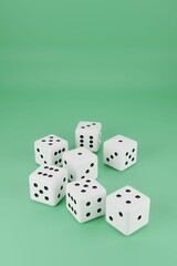 Vertical closeup shot of white playing dice on a green background