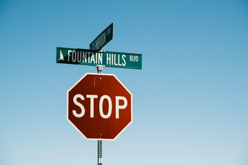 stop sign on blue sky