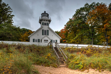 lighthouse surrounded by trees