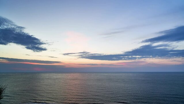Time-lapse of sunset over the sea