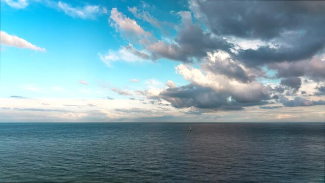 Timelapse of rolling clouds over the sea