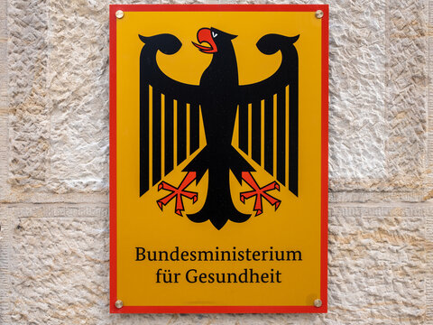 coat of arms of Germany and lettering on a building of the German Federal Ministry of Health