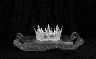 crystal crown on black velvet
