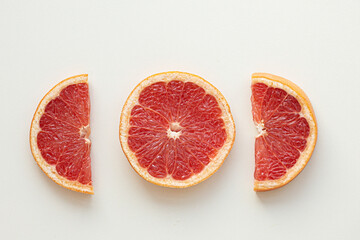 Fototapeta na wymiar Grapefruit citrus fruit with half isolated