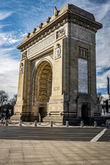 The Triumphal Arch stands tall and proud, a grand monument that has stood the test of time. Its imposing structure and intricate carvings tell a story of triumph and victory, honoring the heroes.