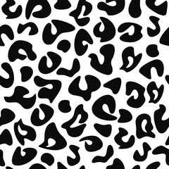 Black monochrome leopard seamless pattern vector. Abstract spots backdrop illustration. Wallpaper, background, fabric, textile, animal skin print, wrapping paper or package design.