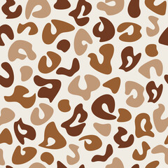 Abstract leopard seamless pattern vector. Random spots backdrop illustration. Wallpaper, background, fabric, textile, animal skin print, wrapping paper or package design.