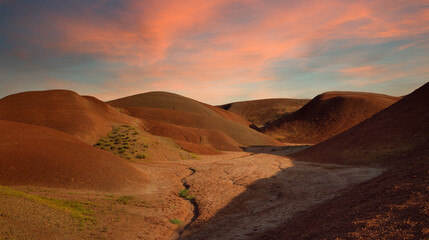 Sunset on the red hills. Arid lands