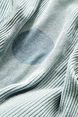 Fototapeta na wymiar Fabric-shirt-clothing-blue-circle-lines-details-folds