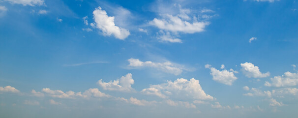Blue sky with beautiful clouds. Wide photo.