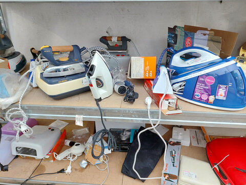 Shelf with second-hand appliances inside a store
