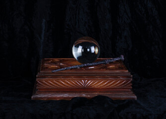 magic ball, magic wand and wooden box