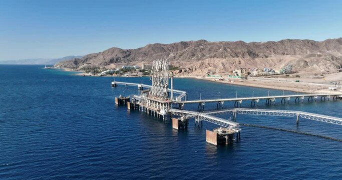 Aerial footage of the oil pipeline station Eilat Ashkelon - "Katza" beach . Filmed in C4K Apple ProRes 422 HQ
