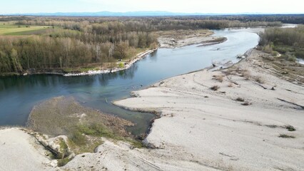 water emergency and drought  due to lack of rain due to global warming and the decrease of glaciers - Drone aerial view of dry river with scarcity of water in Lombardy Pavia - Ticino di Besate 