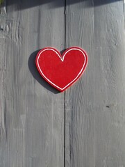 red heart on a wooden wall