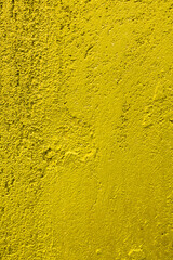 Yellow concrete surface background. Texture, copy space