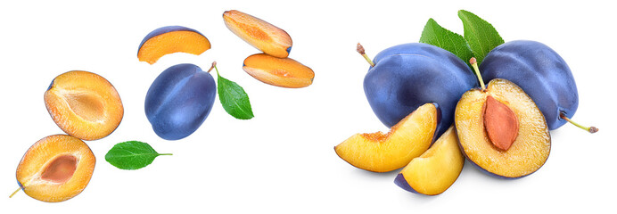 fresh plum and half with leaves isolated on white background. Top view. Flat lay