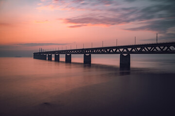 Fototapeta premium The Oresund Bridge is a combined motorway and railway bridge between Sweden and Denmark (Malmo and Copenhagen).