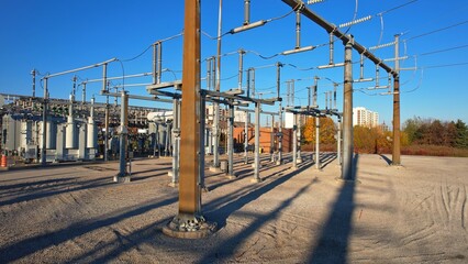 High voltage power grid station. Pylons and high voltage transferring and distribution power...