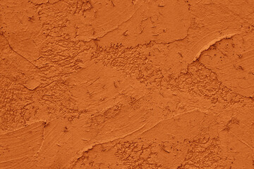 Abstract orange textured stone wall background