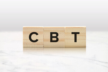 CBT on Wooden Blocks - Cognitive Behavior Therapy Mental Health Concept