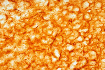 backlit orange tissue paper background